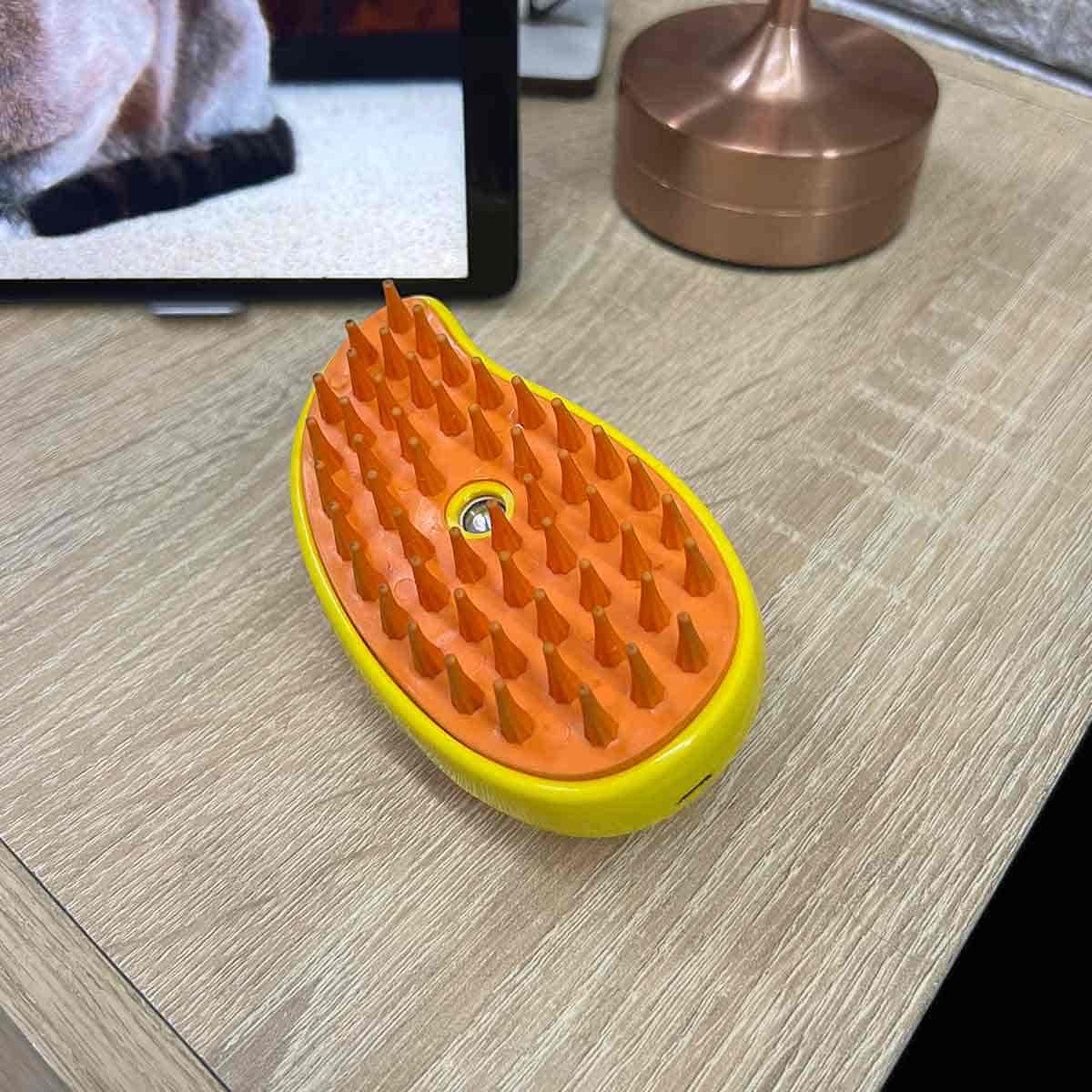 Cepillo Quitapelos con Vapor y Masaje para Perros y Gatos.